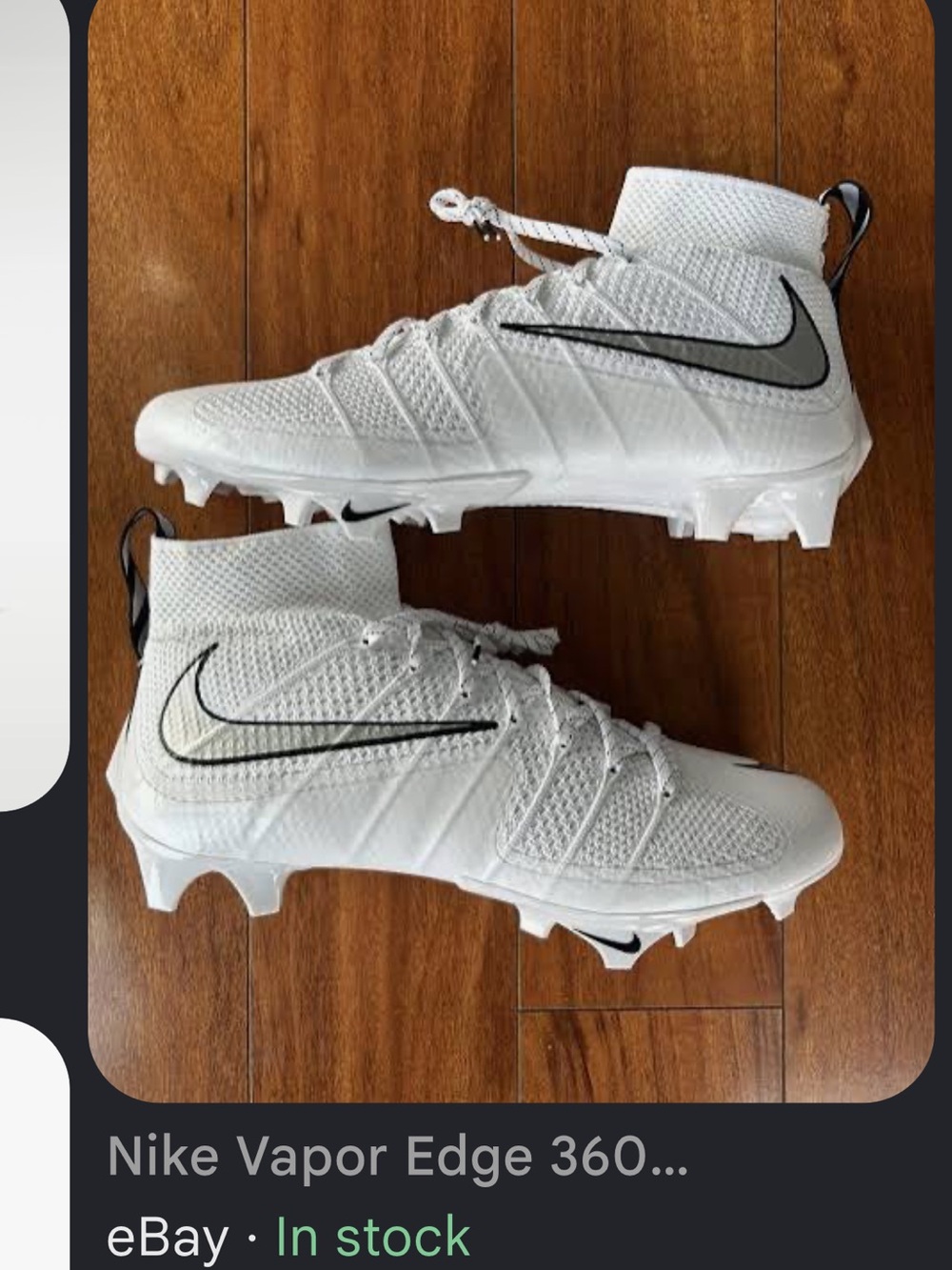 Nike Kids White High-Top Cleats with Black Swoosh